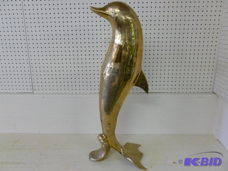 lot 6 image: Large cast brass dolphin floor decoration tha...