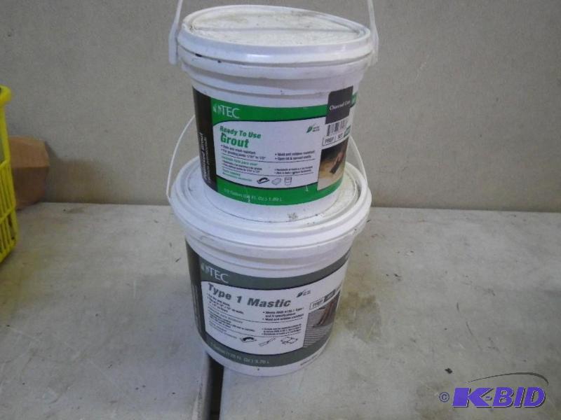 tub of new grout, tub of new adhesive...