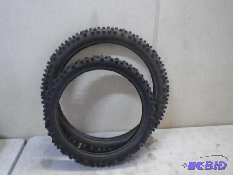 2 dirt bike tires, both have very good tread,...