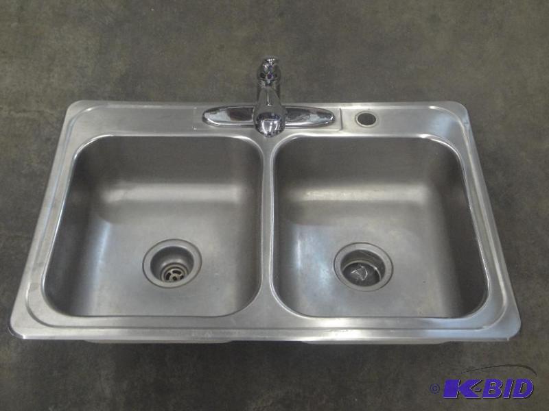 lot 111 image: Double Bowl Stainless Sink With Faucet...