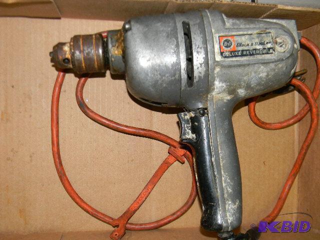 lot 112 image: Black & Decker reversible drill with cord...
