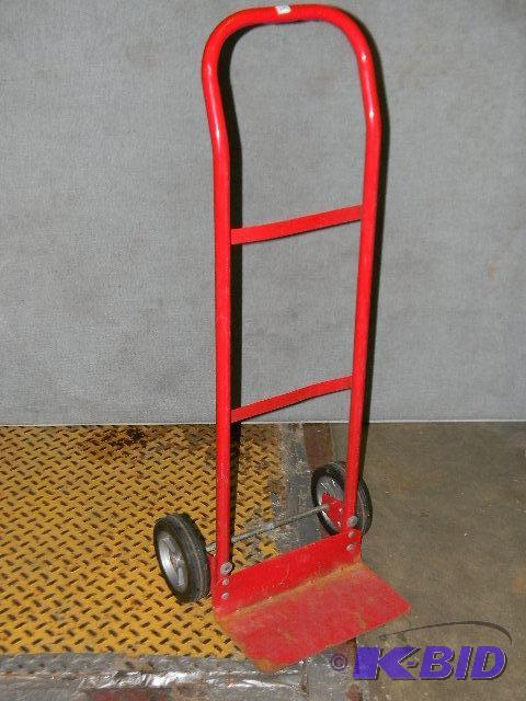 lot 209 image: Red dolly...