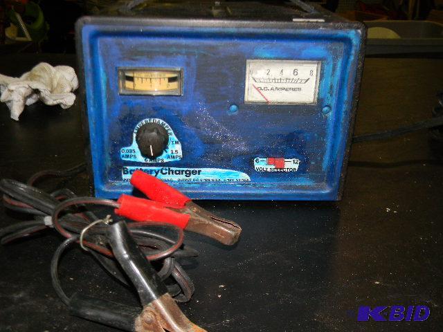 lot 21 image: Battery charger...