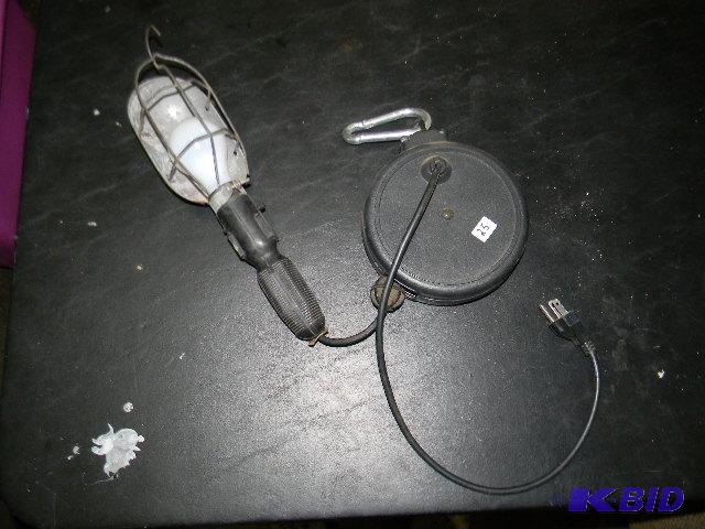 lot 25 image: Work light with retractable cord...