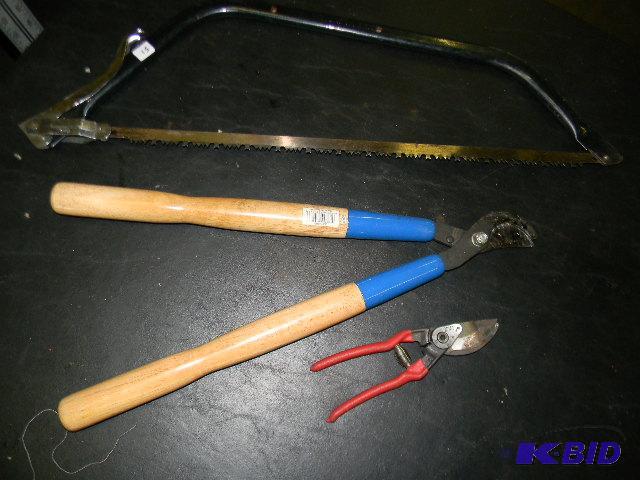lot 51 image: Lot of 3 - two tree pruners and one tree saw...