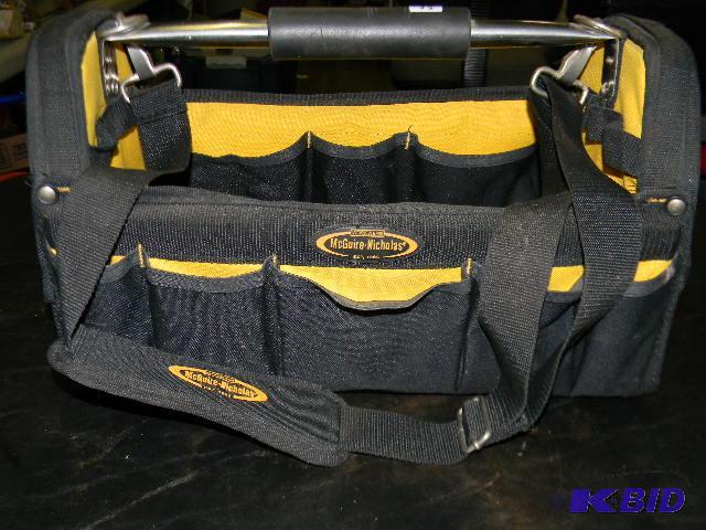 lot 56 image: McGuire-Nicholas black and yellow tool bag...