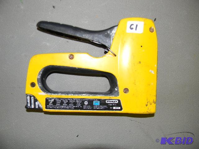 lot 61 image: Stanley staple gun - yellow...