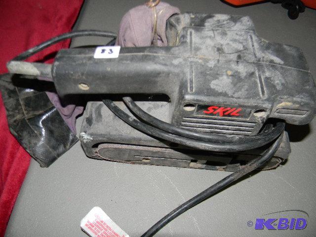 lot 83 image: Skil belt sander...