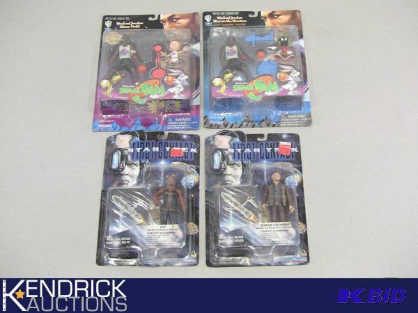 lot 7 image: New in the Package Star Trek First Contact, and Michael Jordan Space Jam Action Figures