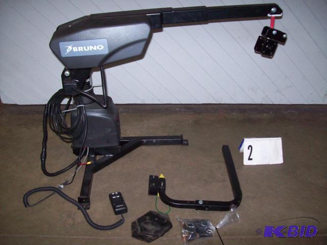 lot 2 image: Bruno VSL-6000 Curb-Sider Wheel Chair  Scoot...