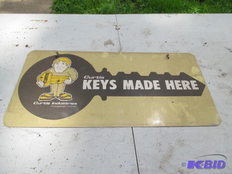 Curtis Key Metal Sign