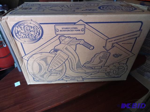 lot 31 image: Mighty Wheels Ride on 3 Wheel Bike. Looks to ...