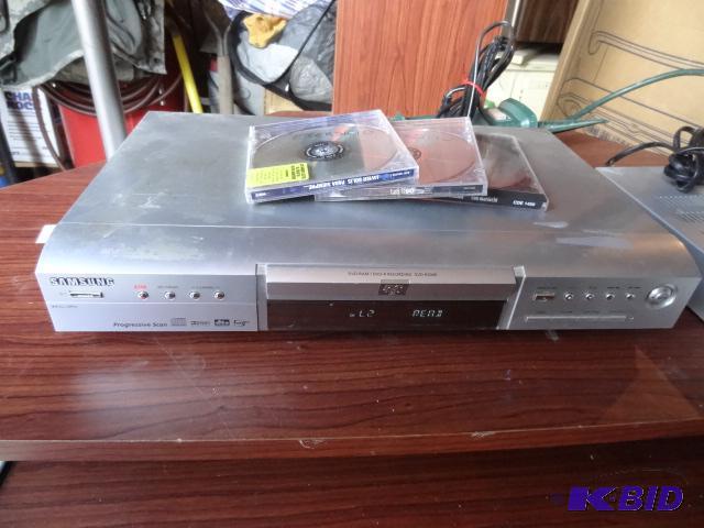 lot 64 image: 2 exercise DVDs. Samsung DVD-R4000 player. P...
