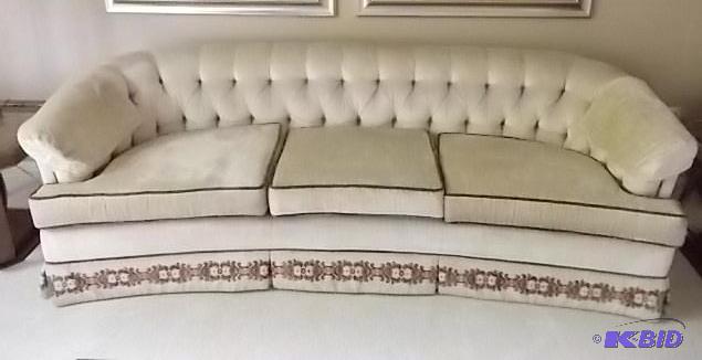 Tufted Back Tan Sofa With Accent On Skirt (7...