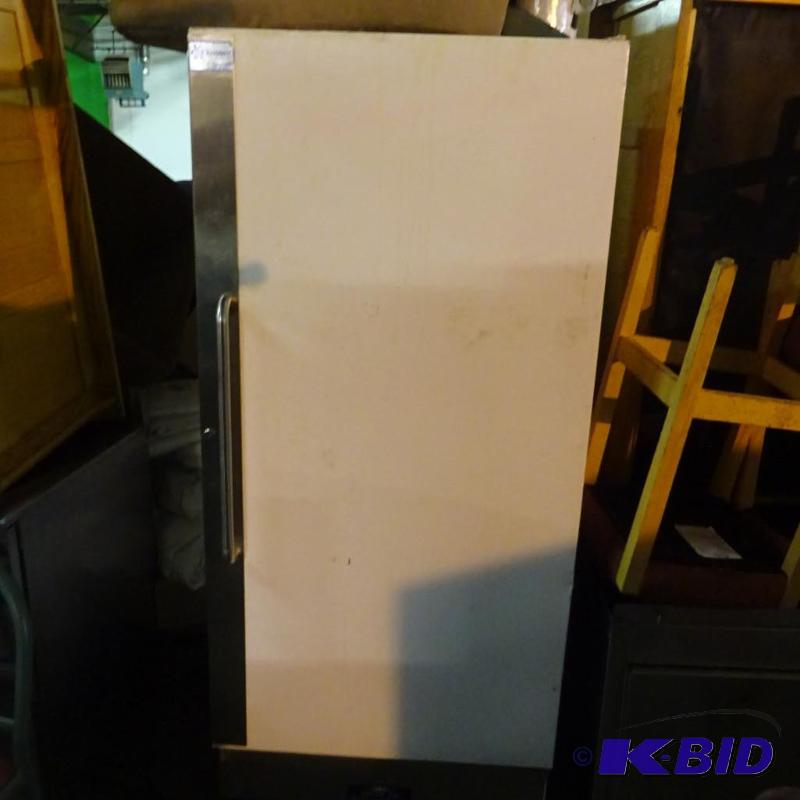 lot 23 image: Single door fridge on wheels. Electrolux corp...