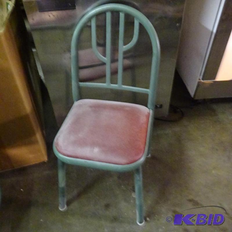 lot 28 image: 4 heavy metal frame restaurant chairs. Padded...