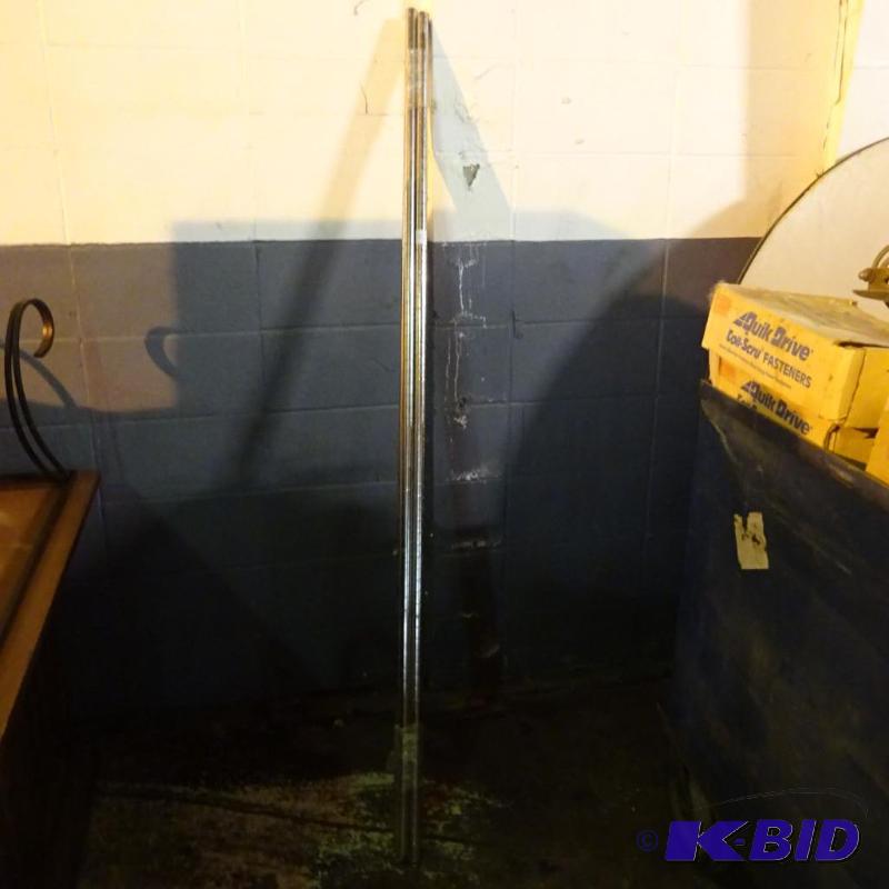 lot 57 image: 4 metro rack poles. 72"...