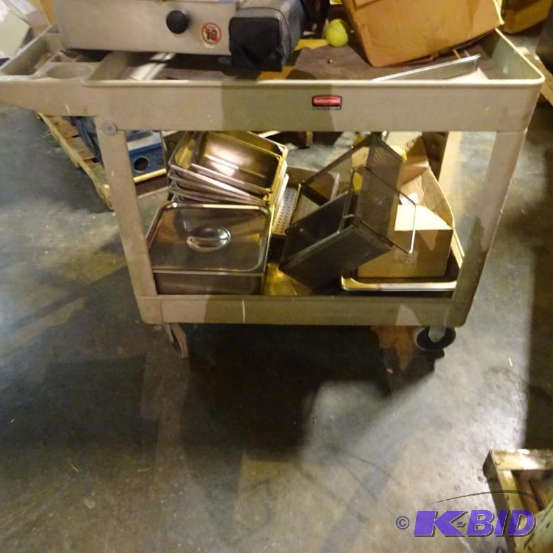 lot 60 image: Rubbermaid poly cart. 36 x 25 x 33. Contents ...