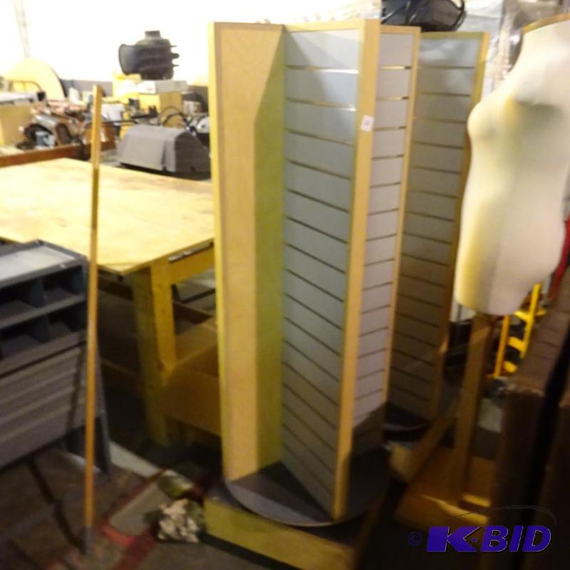lot 66 image: Rotating slat wall display on wheels. 20 x 20...