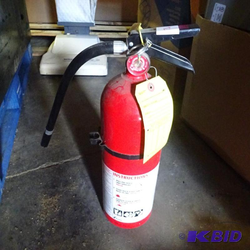 lot 82 image: Fully charged fire extinguisher...