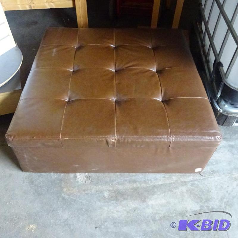 lot 90 image: Brown leather waiting room seat. Has undernea...
