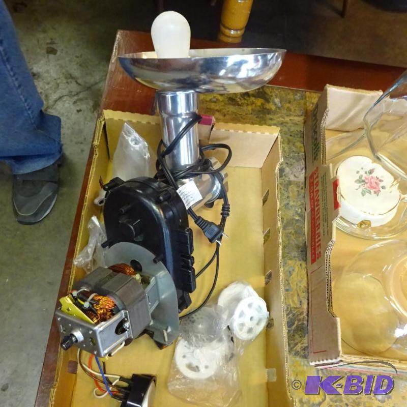 lot 124 image: meat grinder. Works. Missing housing...