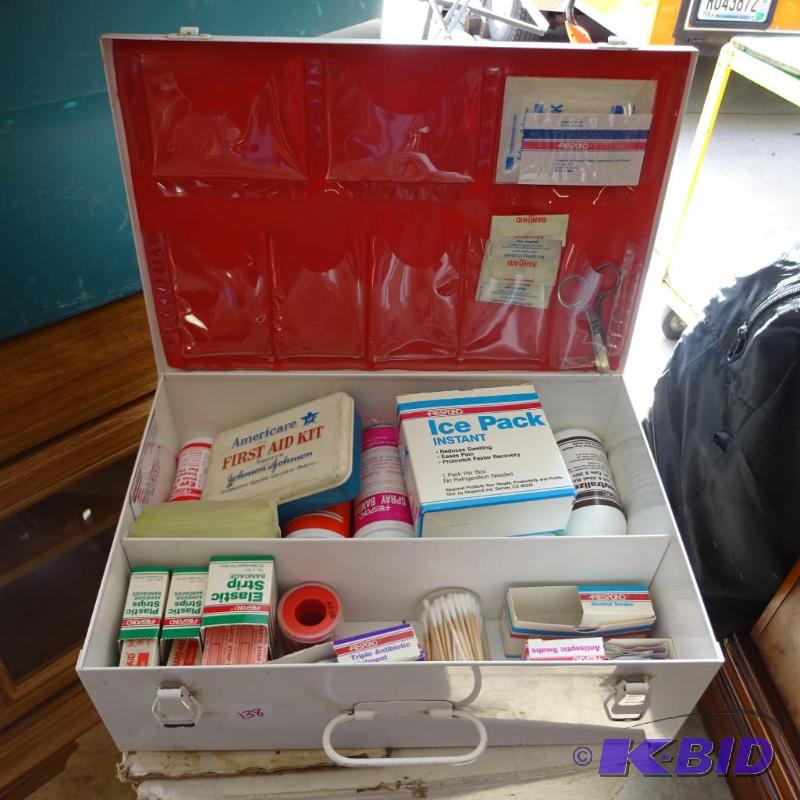 lot 138 image: first aid kit. Metal box. Lots of supplies....