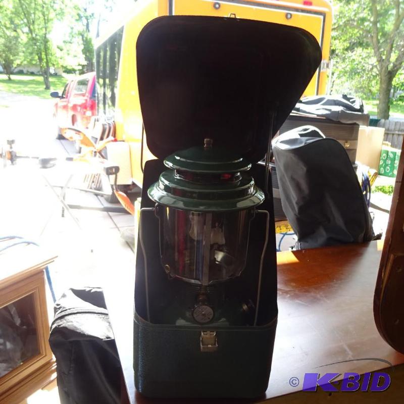 lot 140 image: Coleman white gas lantern in metal box...