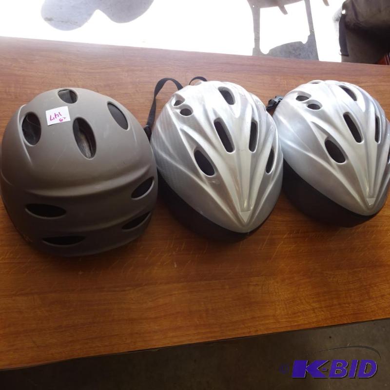 lot 147 image: 3 bicycle helmets. Adult ML...