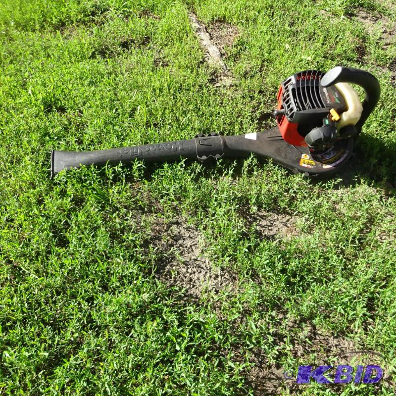 lot 15 image: Homelite Mighty and light blower. 26B. Works,...