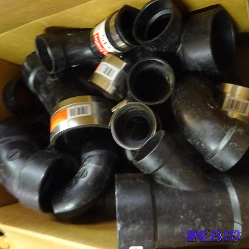 lot 202 image: misc. black PVC pipe fittings . Bath drain. M...