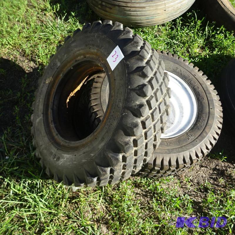 lot 23 image: 13X5.00-6 Rim and tire. 4.103.50-6 tire....