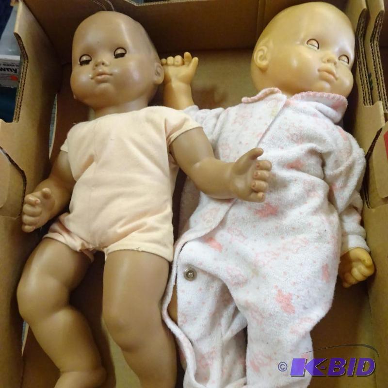 lot 234 image: 2 baby dolls...