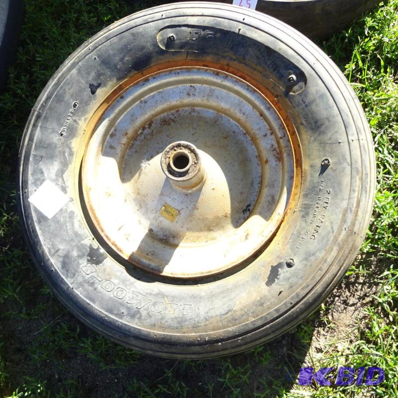 lot 26 image: 4.804.00-8 tire and rim...