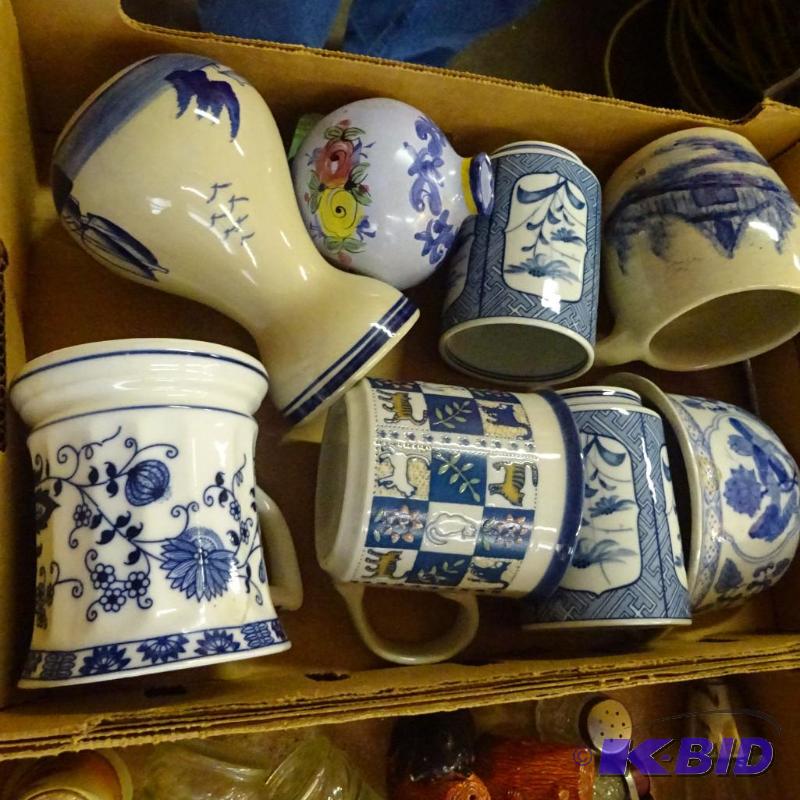 lot 283 image: blue glassware. Vase and coffee cups...