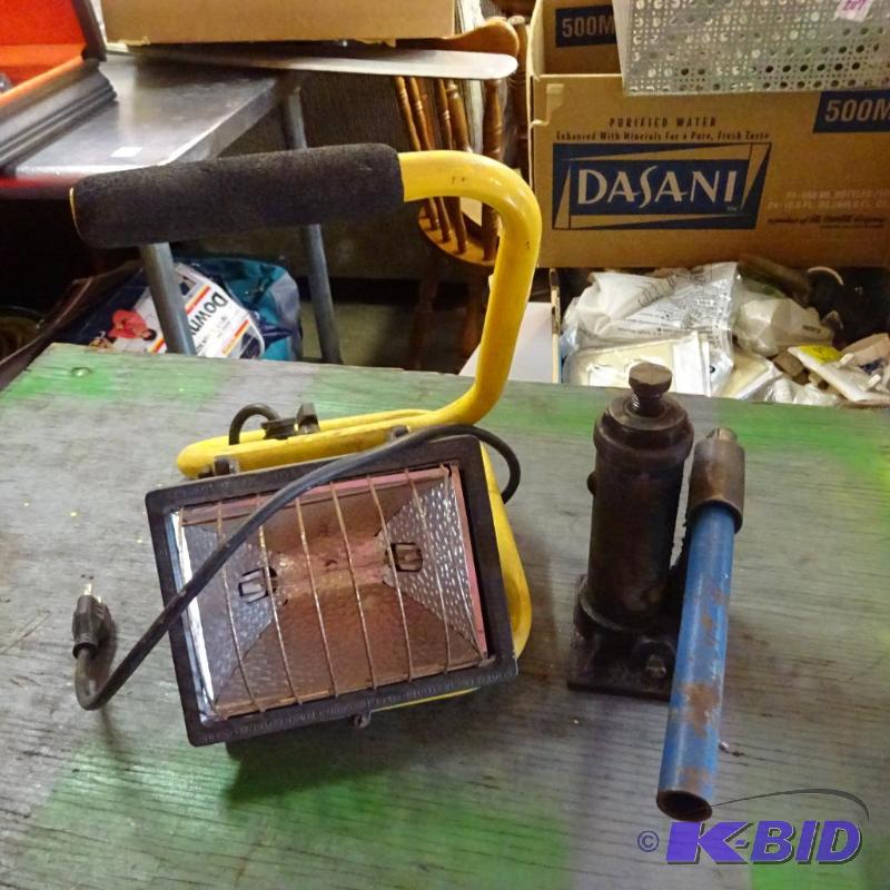 lot 306 image: halosen light . Needs bulb. Small bottle jack...
