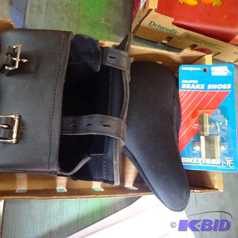 lot 384 image: brake shoes. Bike gel seat. Leather bike sadd...