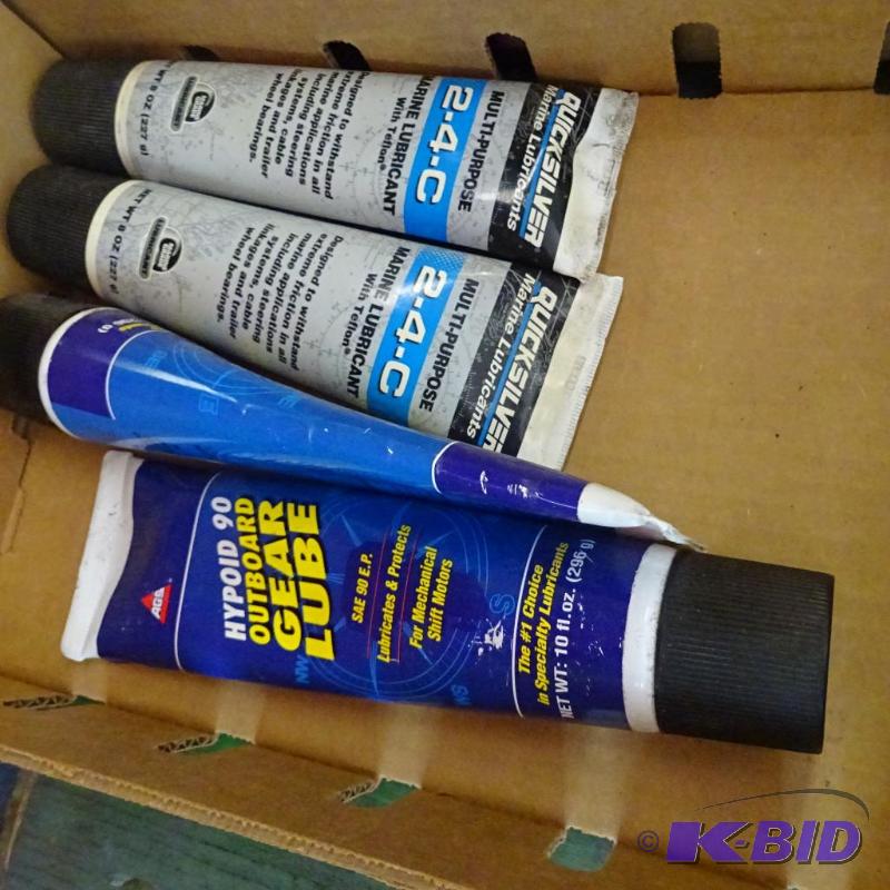 lot 411 image: Outboard motor lube. 4 tubes...