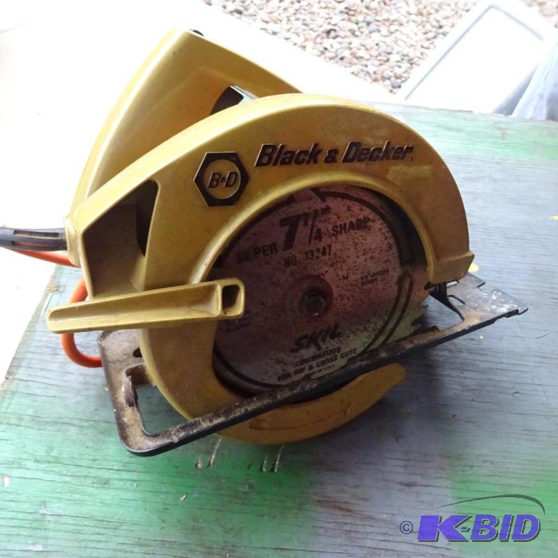 lot 464 image: black and decker. 7 14 circular saw...