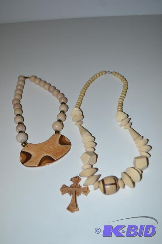 lot 171 image: Hand carved chunky wood necklaces....