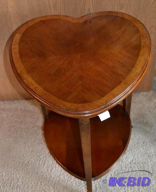 lot 22 image: Wood Heart Shaped end table. 2 tall. Approx....