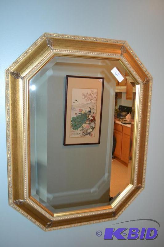 lot 68 image: Gold mirror with beveled glass and ornate fra...