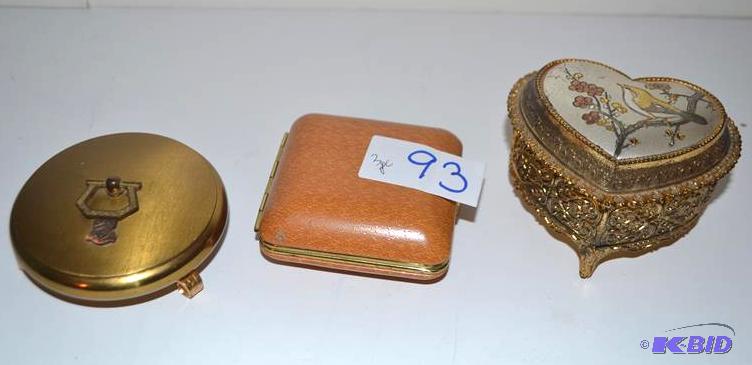 lot 93 image: Vintage jewelry boxes, intricate design on he...