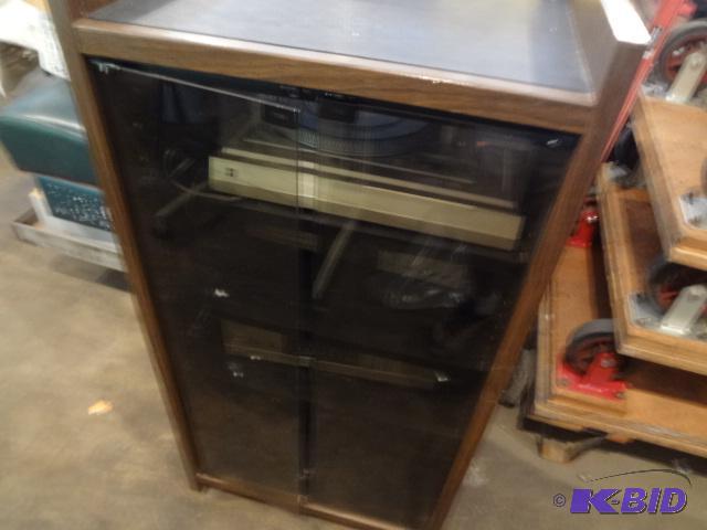 lot 117 image: Complete Stereo System, in glass front case...