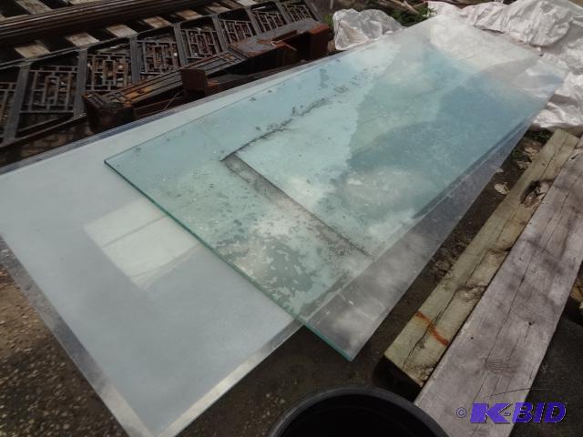 lot 439 image: Two large pieces of tempered glass, one etche...