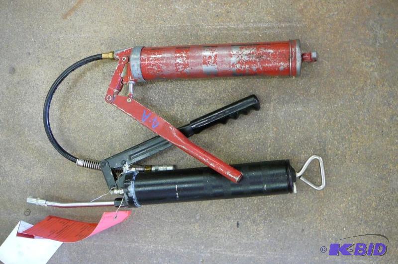 2 Grease Guns 1with straight end 1 Flex hose...