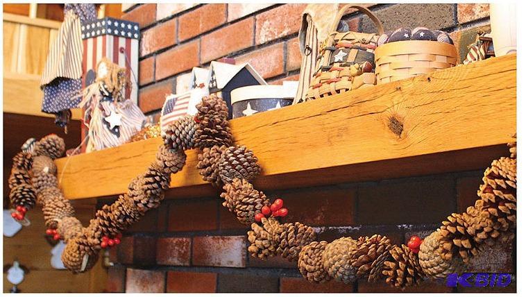 lot 81 image: (5) 9ft Real Pinecone Garland NX048