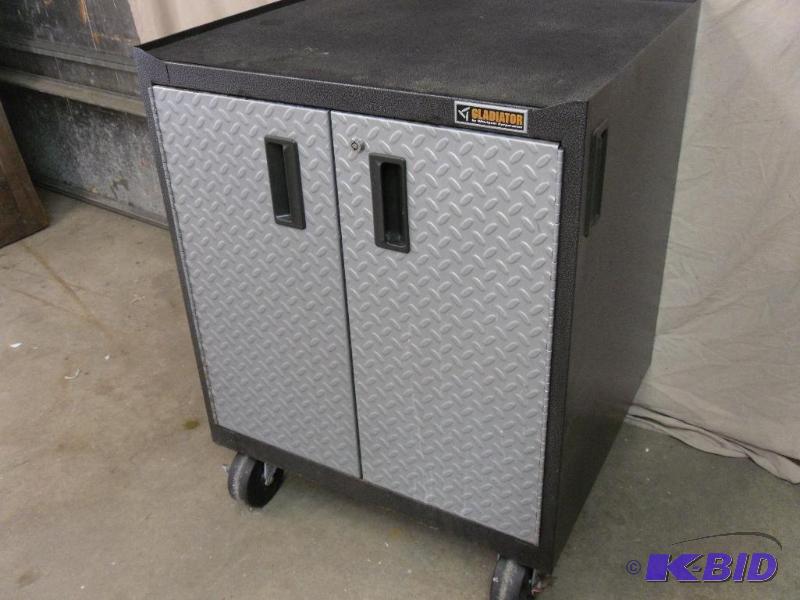 lot 11 image: Gladiator Rolling Cabinet. Adjustable Ball Be...