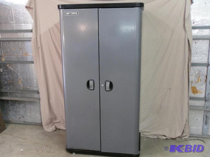 lot 14 image: Large Craftsman 2 Door Cabinet with 3 Shelves...