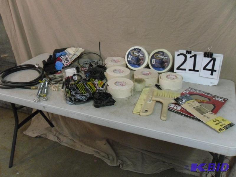 lot 214 image: New Drywall Tape, Window Screen Rope, Hose, a...